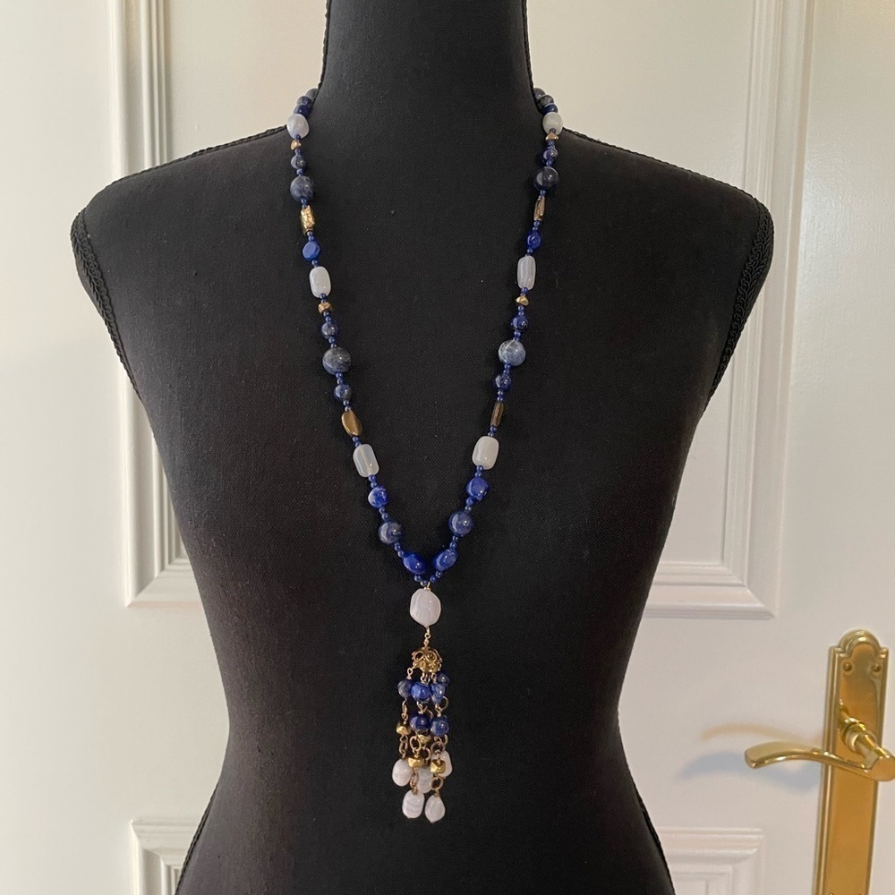 Necklace with tassel.